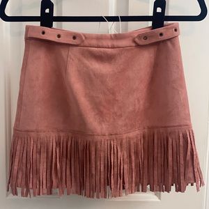 Kittenish blush fringe suede skirt
